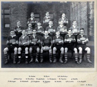 Formal photograph showing sixteen players of the 1930/31 Rugby Team in three rows of seven, six and three from front to back