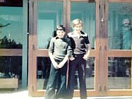 Stuart Anderson and Andrew Stoner standing in front of some patio doors