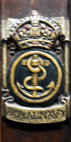 Rope and anchor in a circle surmounted with a crown with the name underneath
