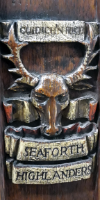 Stag’s head and antlers with Cuidich 'n Righ (Aid the King) above and name underneath