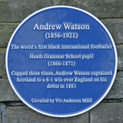 Blue plaque reading: ‘Andrew Watson (1856-1921) The world’s first black international footballer. Heath Grammar School pupil (1866-1871) Capped three times Andrew Watson captained Scotland to a 6-1 win over England on his debut in 1881. Unveiled by Viv Anderson MBE’