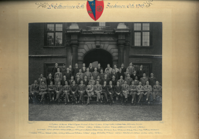 Formal photograph showing three rows of freshers standing behind one seated row