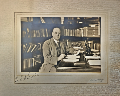 Signed photograph of O.R.A. Byrde at his desk