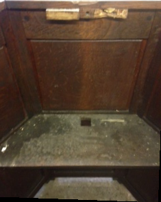 View of the interior of the pulpit before restoration showing dirty surfaces