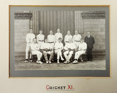 Formal photograph showing six players and a master standing behind five seated players