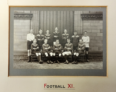 Formal photograph showing seven players standing behind five seated players