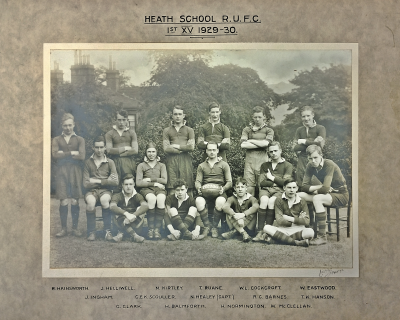 Formal photograph showing six players standing behind five seated players with four seated cross-legged in front of them