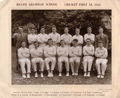 Formal photograph showing seven seated players and six players standing behind them with Mr S.R. Atkins to their left and A. Stott (scorer) to their right