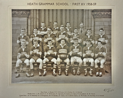 Formal photograph showing three players with Mr H. Birchall to their right standing behind seven standing players with seven seated players in front of them