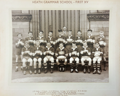 Formal photograph showing nine players standing with Mr H. Birchall standing behind them and seven seated players in front of them