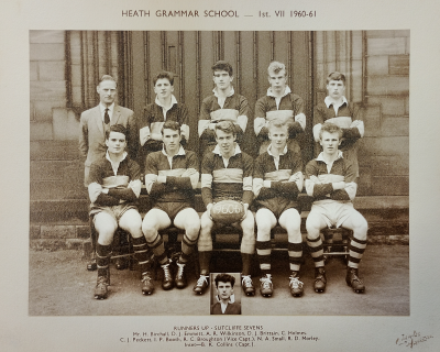 Formal photograph showing four players standing with Mr H. Birchall on the left behind five seated players