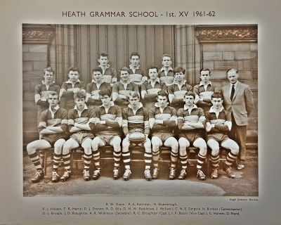 Formal photograph showing three players standing behind seven players standing with Mr H. Birchall on their right behind seven seated players