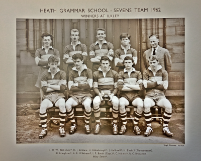 Formal photograph showing four players standing with Mr H. Birchall on the right behind five seated players