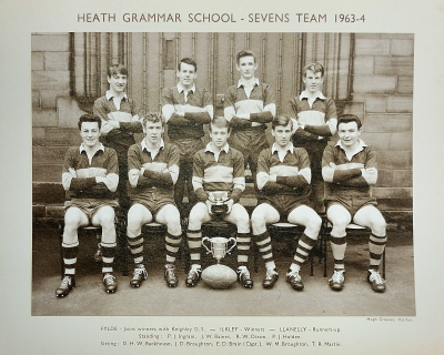 Formal photograph showing four players standing behind five seated players