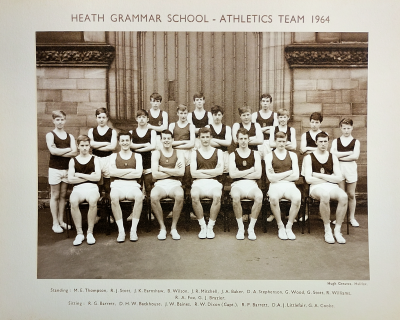 Formal photograph showing three boys standing behind a row of nine boys standing behind a row of seven boys sitting with Mr Birchall standing to the right of the back row
