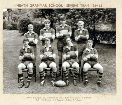 Formal photograph showing four players standing behind four seated players