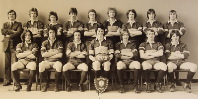 Formal photograph of the 1977/78 Rugby Team in two rows with Tony Edwards on the left